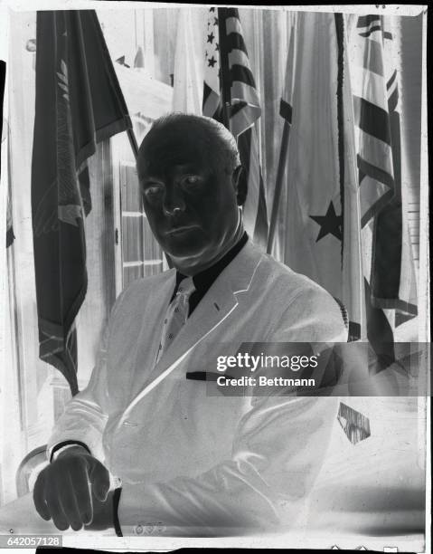 Secretary of the Interior Fred A. Seaton is shown as he posed for pictures in his office.