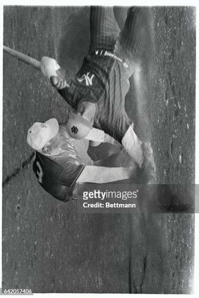 New York Yankees' Bobby Richardson slides home under late tag of San Francisco Giants pitcher Jack Sanford, in the sixth inning of the fifth World...
