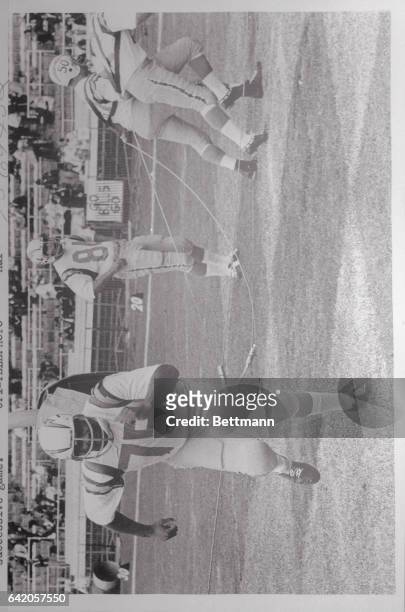 Buffalo, NY: Ernie Wright , San Diego's offensive left-tackle, strains against the Charger's isometric harness as he limbers up before the...