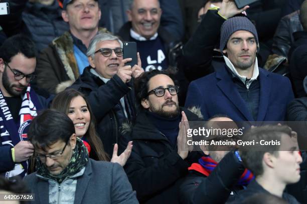 Paris Saint-Germain supporters, son of François Hollande celebrate victory after the UEFA Champions League Round of 16 first leg match between Paris...