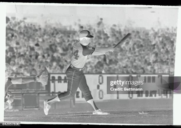 Brewer's Hank Aaron crashes into Oakland A's catcher Larry Haney knocking the latter to his knees as Aaron tried to score in the 4th inning on June...