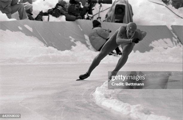 Eric Heiden of Madison, Wisconsin, shows the form in 1,000-meter competition 2/12 that helped him to take the Gold medal in the men's World Sprint...