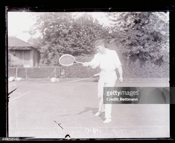 Following negatives were especially posed for International News Service by Maurice McLaughlin, national tennis champion and star of the American...