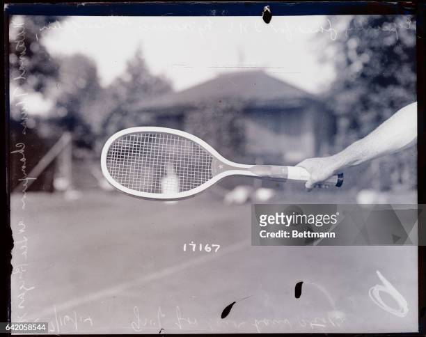 Following negatives were especially posed for International News Service by Maurice McLaughlin, national tennis champion and star of the American...