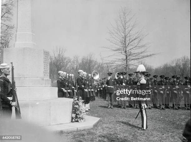 Lord Tweedsmuir Lays Wreath at Canadian Cross. Governor General Tweedsmuir, of Canada, standing at attention after placing a wreath at the foot of...