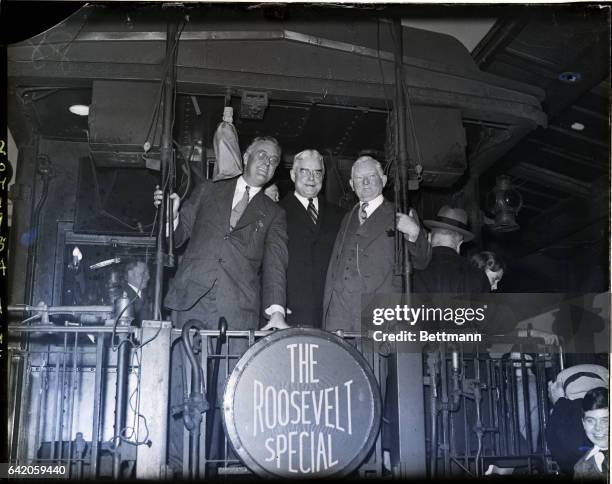 Washington, DC: Gov. Franklin D. Roosevelt, Gov. Albert C. Ritchie of Maryland and John N. Garner, are shown on the rear platform of Gov. Roosevelt's...