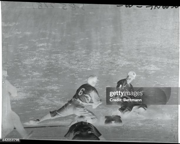 New York: Yankee Shortstop Safe On Third After Triple. Frank Crosetti is shown sliding safely into 3rd base after hitting a triple, scoring Flash...