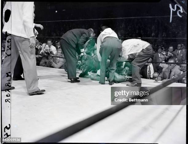 New York, NY- Joe Louis loses his world heavyweight title to Rocky Marciano. Referee Ruby Goldstein stopped the fight after 2 minutes and 36 seconds...