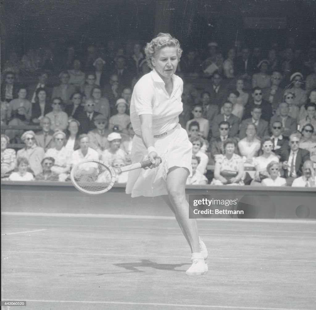 Louis Brough Swinging Tennis Racquet