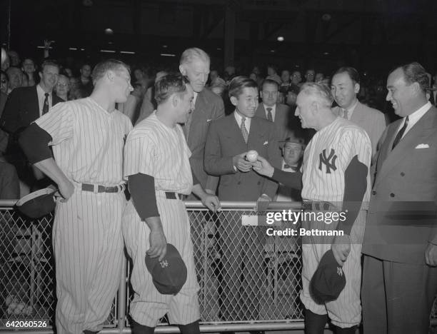 Crown Prince Akihito of Japan attended the twi-night double header between the New York Yankees and the St. Louis Browns at Yankee stadium in this...