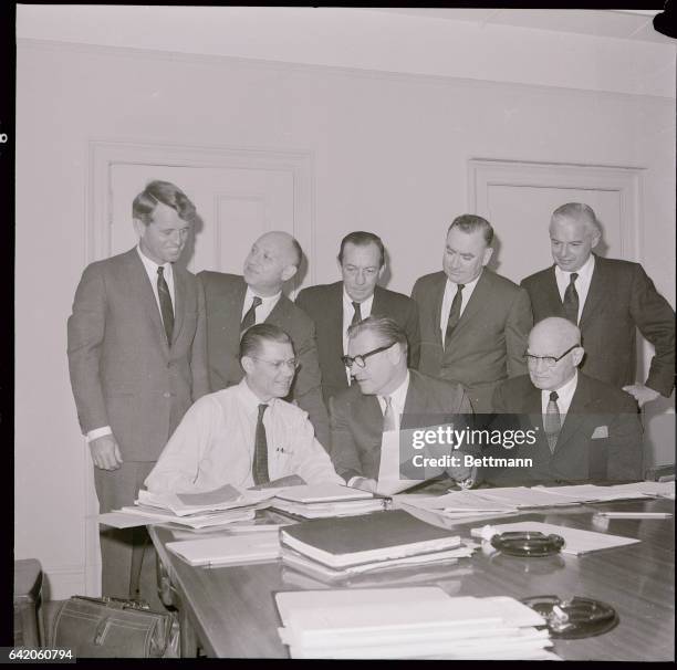 In the front row, Secretary of Defense Robert McNamara confers with New York Governor Nelson Rockefeller , while Congressman Emanuel Celler sits . In...