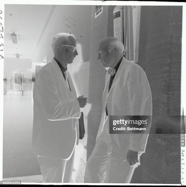 This is a photo of Dr. William Norcross, , the director of Medicine at Bridewell city Jail Hospital, as he converses with prosecutor William J....