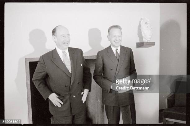 Taking over as American Ambassador to the United Nations, Adlai Stevenson, , stands with the U.N. Secretary General Dag Hammarskjold. They met to...