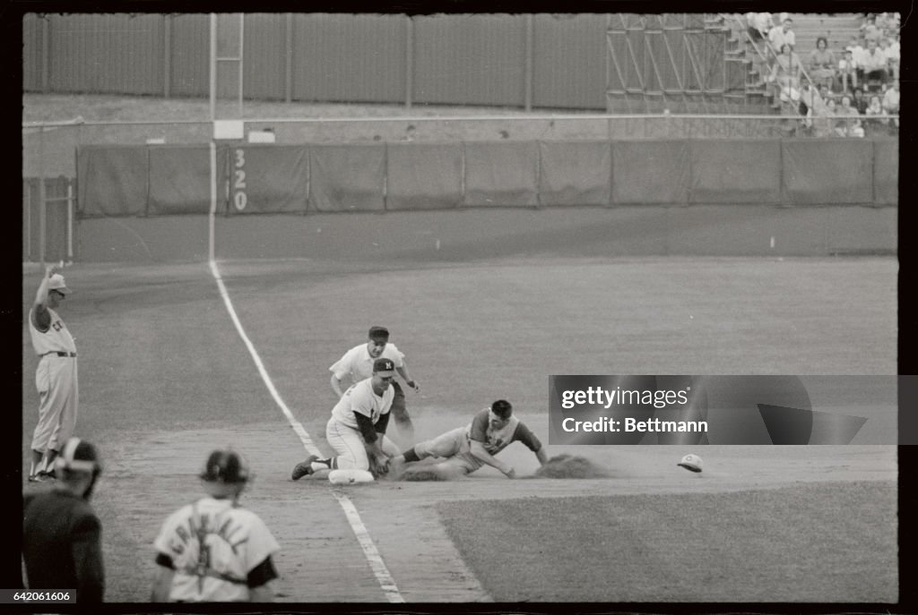 Pete Rose Sliding Into Third Base