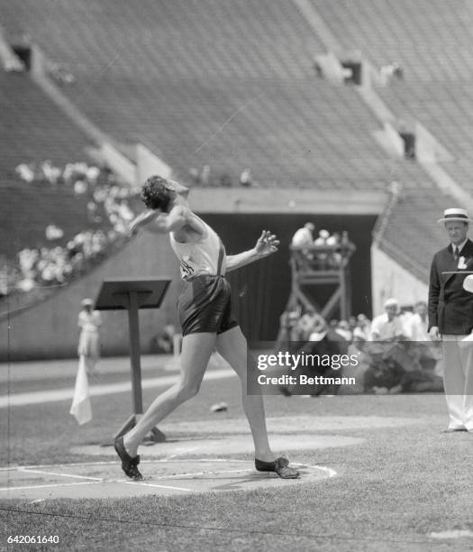 Peter Bacasalmasi of Hungary tosses the discus during the decathlon event in the Los Angeles Olympic Games here. Bacsalmasi finished tenth in the...