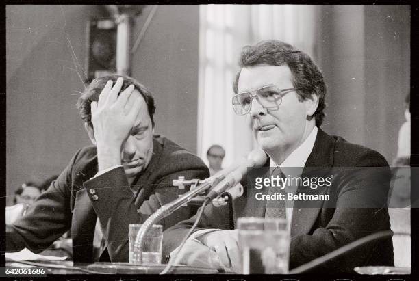 Labor Secretary designate Ray Donovan and Senator Bill Bradley, D-N.J. Listens to testimony here as Assistant FBI Director Francis Mullen tells...
