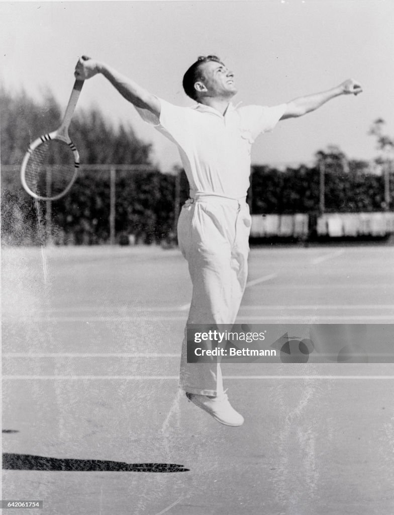 Bryan M. Grant in Tennis Swinging Action