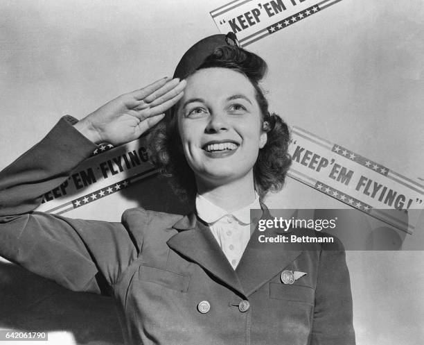 Chosen to reign over "Keep 'Em Flying" week in Chicago, first job of Hilda Pittenger of New York was to preside over the induction of 40 recruits...