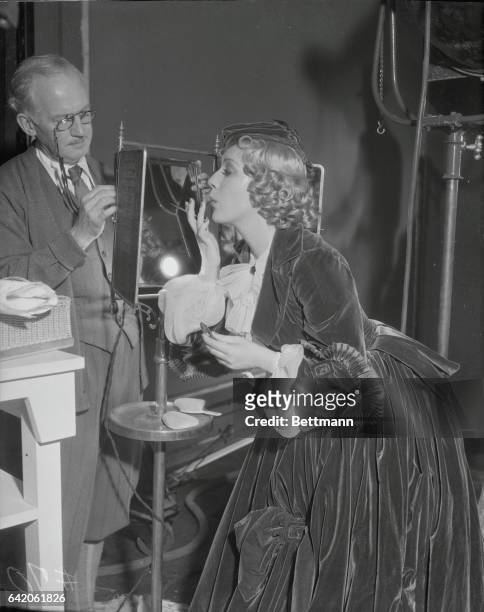 Los Angeles, California: Preparing For Her Come Back. Mary Pickford, long known as America's "Sweetheart of the screen" puts the finishing touches to...