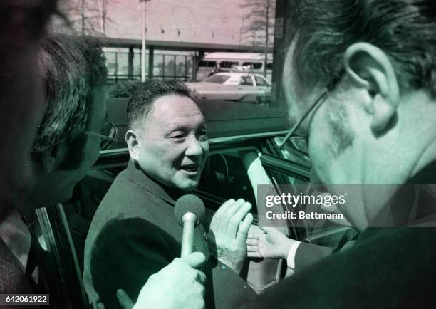 When President Ford arrives in Peking he probably will be greeted by Vice Premier Deng Xiaoping, seen here greeting a a visiting dignatary in April...