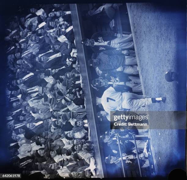 Forbes Field, PA: Yankee Mickey Mantle, No. 7, walks to dugout after hitting a homer in the fifth inning. It was Mantle's 12th World Series homer and...