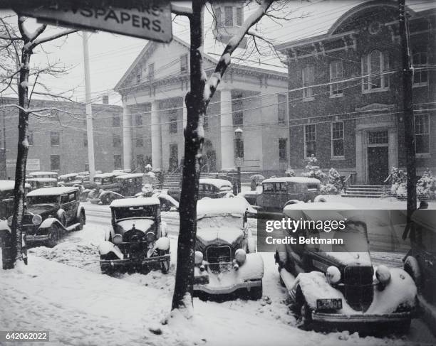 Flemington, N. J.: Snow Blankets Flemington. The streets of Flemington, N. J., take on a soft white carpet as flake on flake sifts down, almost...