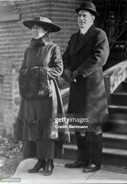 Here Miss Rankin is pictured in front of the old Rankin Home in Missoula with her brother Wellington, a Helena attorney who served as her campaign...