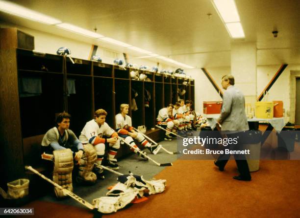 Head coach Al Arbour of the New York Islanders walks in the locker room before an NHL game circa September, 1983 at the Nassau Coliseum in Uniondale,...