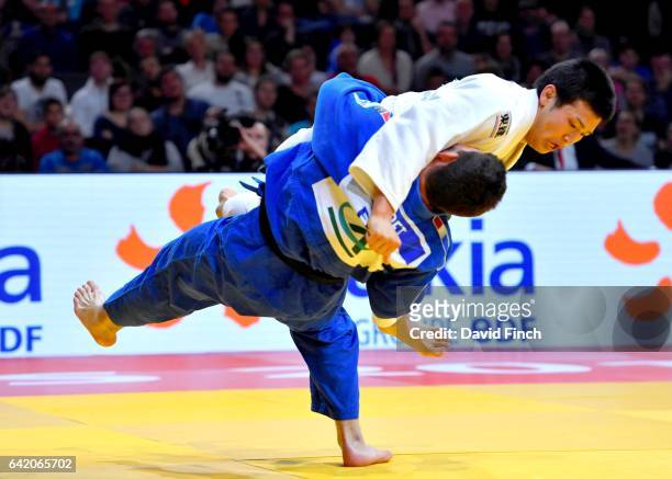Cyrille Maret of France attempts to throw 18 year old, Kentaro Iida of Japan with a sacrifice throw but is unsuccessful losing the u100kg final to...