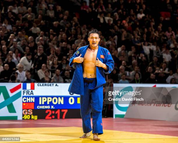Xunzhao Cheng of China throws Axel Clerget of France for an ippon to win the u90kg gold medal during the 2017 Paris Grand Slam at the AccorHotels...