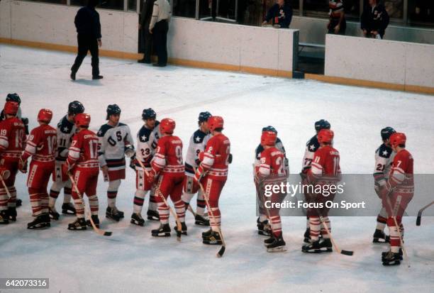 The United States Hockey team shakes hands with the Soviet Union after a metal round game of the Winter Olympics February 22, 1980 at the Olympic...