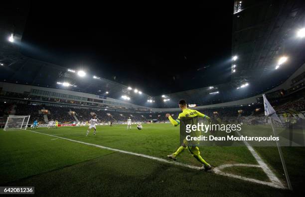 Danijel Milicevic of KAA Gent takes a corner during the UEFA Europa League Round of 32 first leg match between KAA Gent and Tottenham Hotspur at...