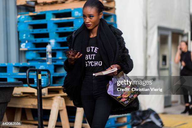 Model outside Anna Sui on February 15, 2017 in New York City.