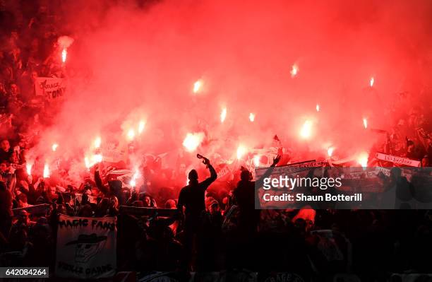 Saint-Etienne fans show their support during the UEFA Europa League Round of 32 first leg match between Manchester United and AS Saint-Etienne at Old...