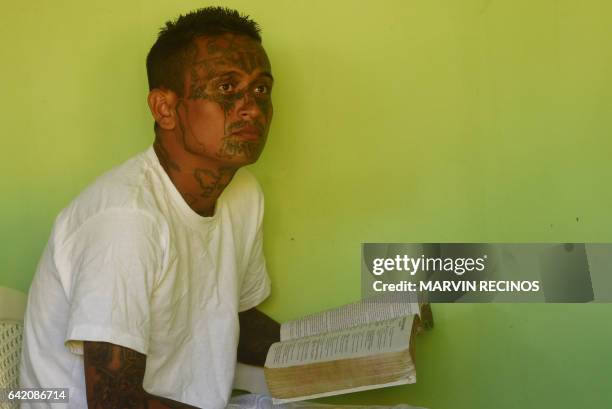 Former 18th Street gang member attends a class on biblical education at the San Francisco Gotera prison, 165 km from San Salvador, on February 16,...