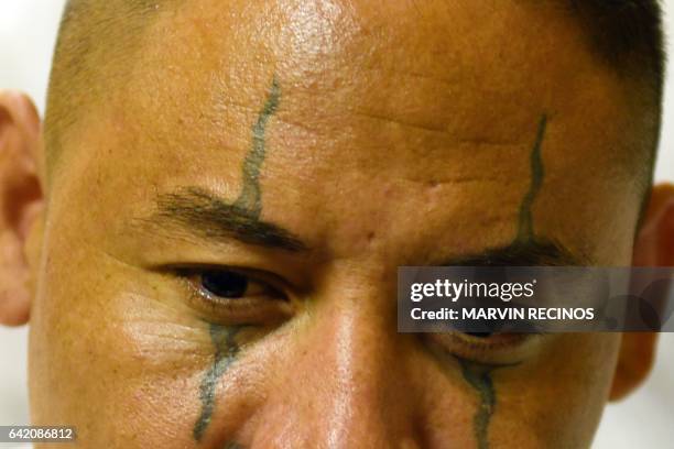 Former 18th Street gang member attends a class on biblical education at the San Francisco Gotera prison, 165 km from San Salvador, on February 16,...