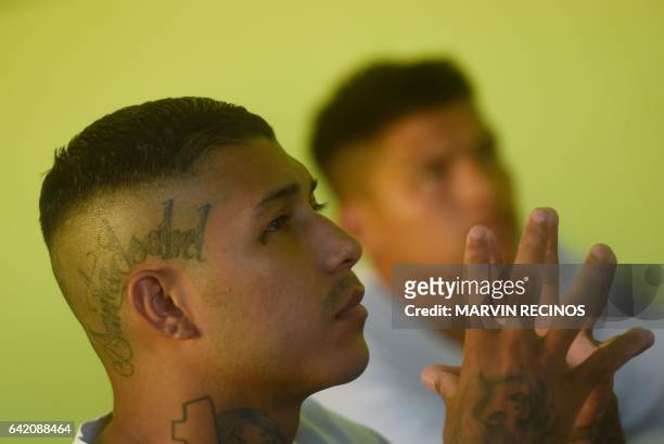 Former 18th Street gang member attends a class on biblical education at the San Francisco Gotera prison, 165 km from San Salvador, on February 16,...