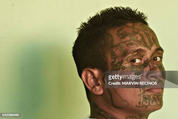 Former 18th Street gang member attends a class on biblical education at the San Francisco Gotera prison, 165 km from San Salvador, on February 16,...