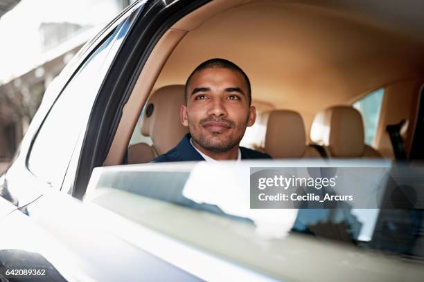 starting his first job in the city - man sitting inside car stock pictures, royalty-free photos & images