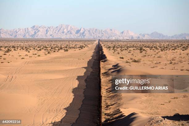 Section of the US/Mexico border fence is seen at San Luis Rio Colorado, Sonora state, on February 15, 2017 in northwestern Mexico. Attention Editors:...