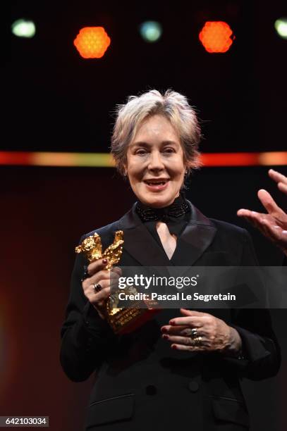 Costume designer Milena Canonero poses on stage with the Honorary Golden Bear at the 'The Shining - Hommage Milena Canonero' premiere during the 67th...