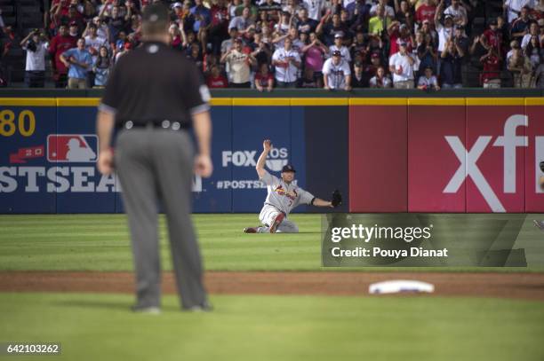 Wild Card Game: St. Louis Cardinals Matt Holliday in action, fielding vs Atlanta Braves at Turner Field. Holliday misses ball. Atlanta, GA 10/5/2012...