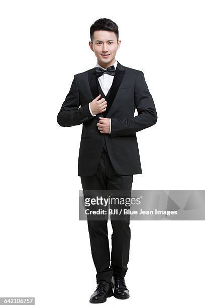 portrait of young man - dinner jacket stock pictures, royalty-free photos & images