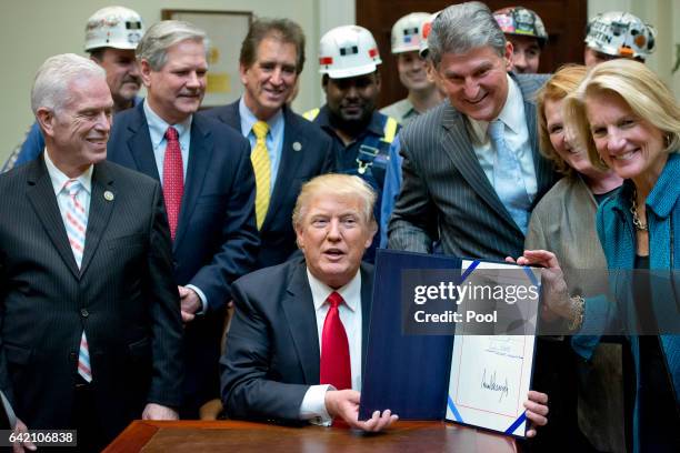 President Donald Trump signs H.J. Res. 38, disapproving the rule submitted by the US Department of the Interior known as the Stream Protection Rule...