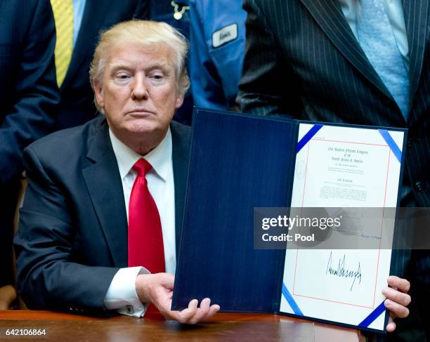 President Donald Trump signs H.J. Res. 38, disapproving the rule submitted by the US Department of the Interior known as the Stream Protection Rule...