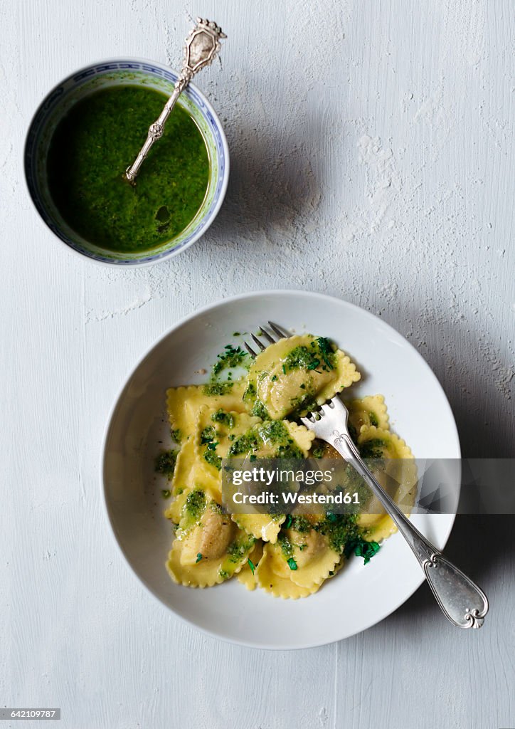 Homemade ravioli with pesto