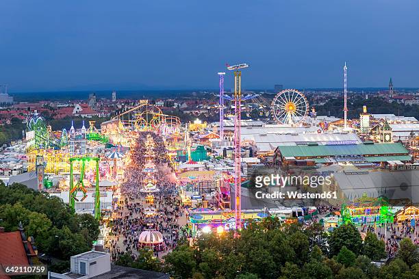 germany, munich, beer fest overview at twilight - monaco national day 2016 foto e immagini stock