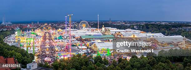 germany, munich, beer fest overview at twilight - beer hall foto e immagini stock