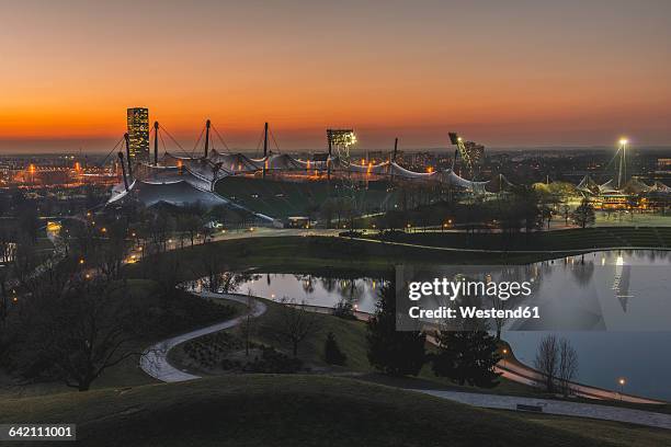 germany, munich, olympic park and olympiastadion at sunset - olympiastadion munich bildbanksfoton och bilder