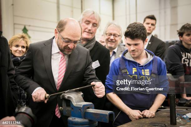Martin Schulz , the chancellor candidate of the German Social Democrats visits vocational assistance for youth on February 16, 2017 in Essen,...